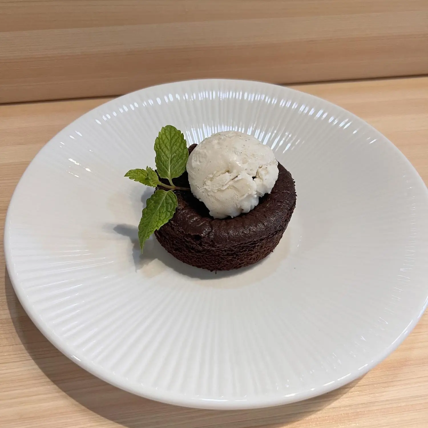 Warm chocolate lava cake served with vanilla ice cream at Ginza Sushi and Ramen, a Japanese Restaurant in Salem